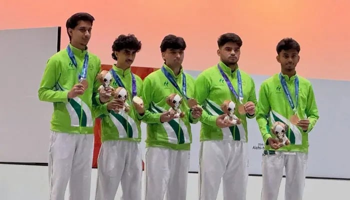 Pakistans PUBG Mobile team players pose with bronze medals after finishing third in the Asian Games esports competition at the Aichi Sky Expo in Tokoname on September 29, 2026. — Pakistan Olympic Association