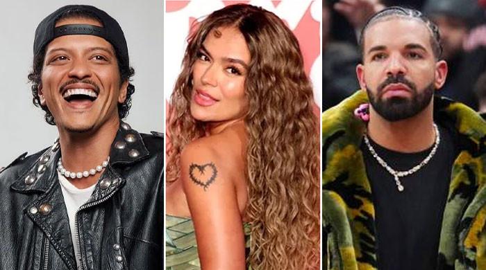 Bruno Mars reacts to Drake dancing with his ‘Latina Crush' Karol G