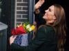 Princess Kate beams as she leaves with flowers and message of support