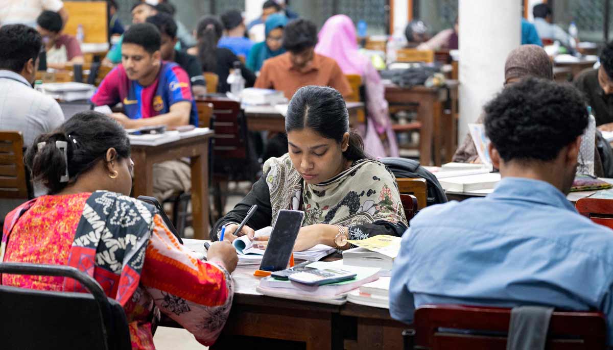 Students studying inside the library at Dhaka University in Dhaka.