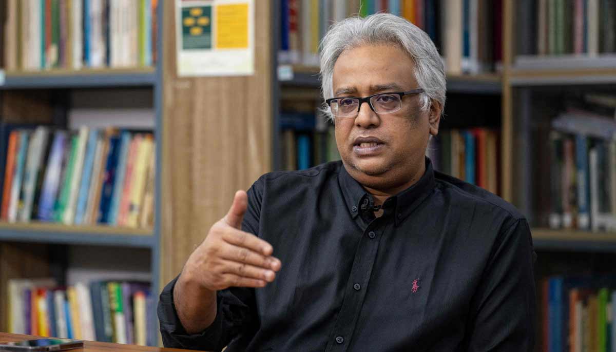 Asif Shahan, a professor at Dhaka Universitys Department of Development Studies speaking during an interview with AFP inside the campus in Dhaka.— AFP