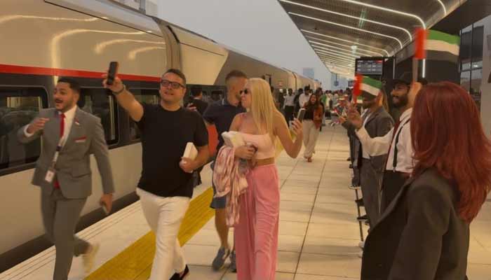 Passengers run to board Etihad Rail during the launch ceremony of Etihad Rail, United Arab Emirates, September 30th, 2026. — Geo News