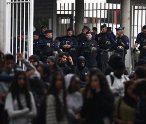 Injuries and arrests as high school students keep up blockade of French schools
