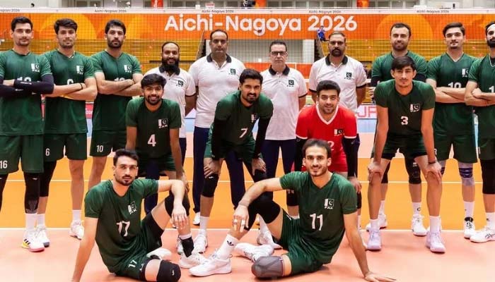 Pakistan team poses for a picture after winning their Asian Games mens volleyball competition match against Kazakhstan at the Okazaki Chuo Sogo Park in Okazaki City on September 27, 2026. — Pakistan Volleyball Federation