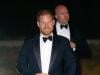 Prince Harry steps out in tuxedo for gala with special auction item from past