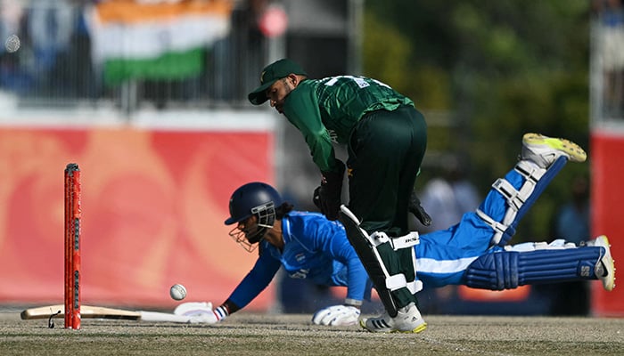Indias Tilak Varma avoids a runout to score a half century during the mens cricket final match between Pakistan and India during the 2026 Asian Games at the Korogi Athletic Park in Nisshin on October 3, 2026. — AFP