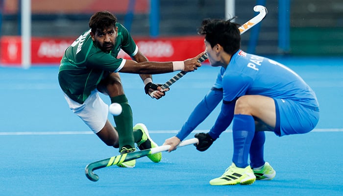 Pakistans Muhammad Abdullah (left) plays a shot during the mens hockey bronze-medal match against South Korea at Gifu Prefectural Green Stadium in Kakamigahara, Japan, on October 3, 2026. — Reuters
