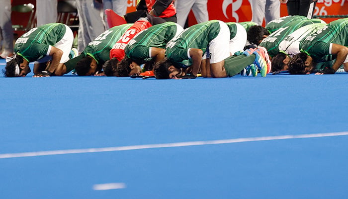 Pakistan players bow down to pray after winning the bronze medal in the mens hockey competition at the Asian Games in Kakamigahara, Japan, October 3, 2026. — Reuters