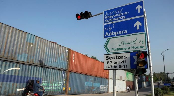 Govt rejects reports on Islamabad roads closure, says containers placed as precaution
