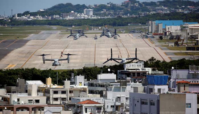 US Marine Corps MV-22 Osprey aircraft are seen at the US Marine Corps Futenma Air Station in Ginowan on Japans southernmost island of Okinawa, March 24, 2018. — Reuters