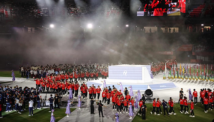 Members of the Japan contingent parade during the closing ceremony of the 2026 Asian Games at Nagoya City Mizuho Park Athletic Stadium in Nagoya, Aichi Prefecture on October 4, 2026. — AFP