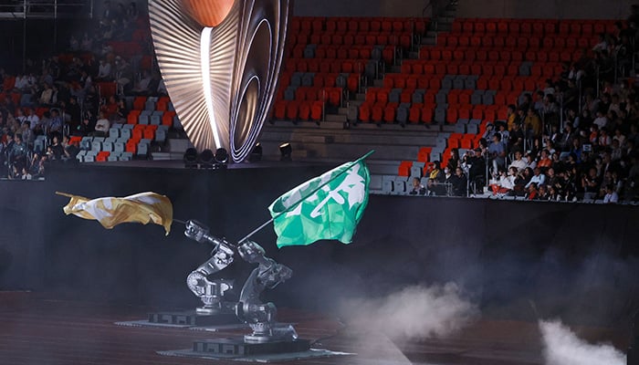 Robotic arms with flags are seen during the closing ceremony of the 2026 Asian Games at Nagoya City Mizuho Park Athletic Stadium in Nagoya, Aichi Prefecture on October 4, 2026. — AFP