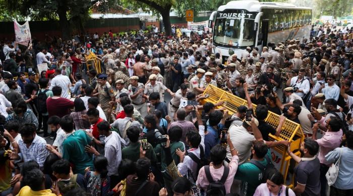 Indians protest election chief as police probe harassment claims