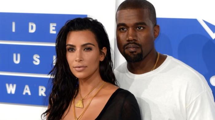 Kim Kardashian admits she and Kanye West have improved communication over children