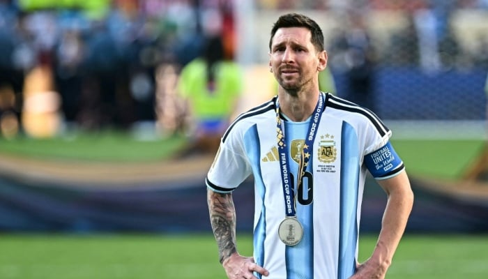 Lionel Messi celebrates scoring in his final international appearance for Argentina — AFP