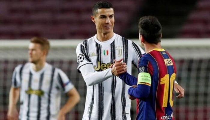 Cristiano Ronaldo with Lionel Messi before the Champions League Group G match on December 8, 2020. — Reuters