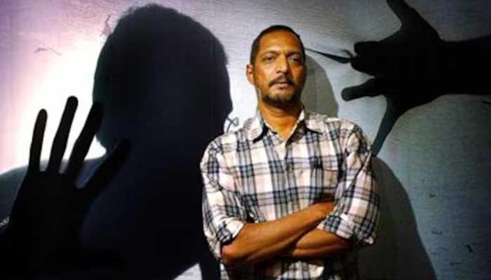 Bollywood star Nana Patekar poses for photographers during a media gathering in Bombay March 3, 2004. — Reuters