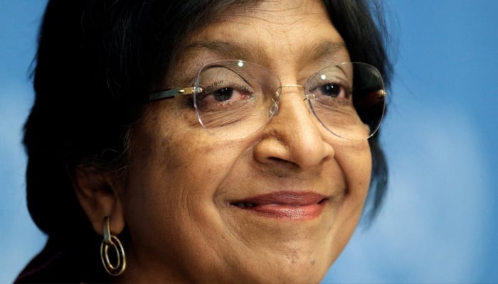 UN High Commissioner for Human Rights Navi Pillay smiles during a news conference at the United Nations European headquarters in Geneva, Switzerland October 18, 2012. — Reuters