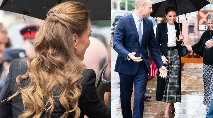 Princess Kate's rain-soaked elegance shines brightest against clouds