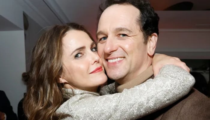 The couple share a 10-year-old son, Sam, and help raise Russells two older children from her first marriage