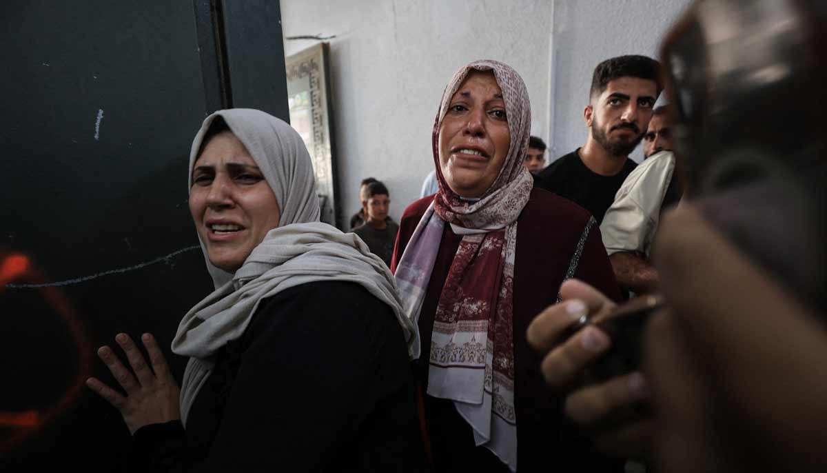 Mourners react during the funeral of Hussam Hawso, an 8-year-old Palestinian boy who was reportedly killed in an Israeli strike on residential buildings in the Sabra neighbourhood the previous night, at Al-Shifa Hospital in Gaza City on October 9, 2026.— AFP
