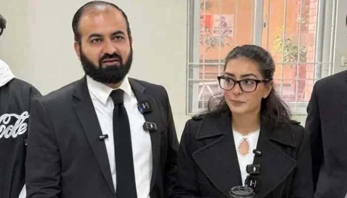 Human rights lawyer Imaan Mazari (right) with her husband and fellow lawyer Hadi Ali Chattha, during a court hearing in Islamabad on December 5, 2025. — AFP