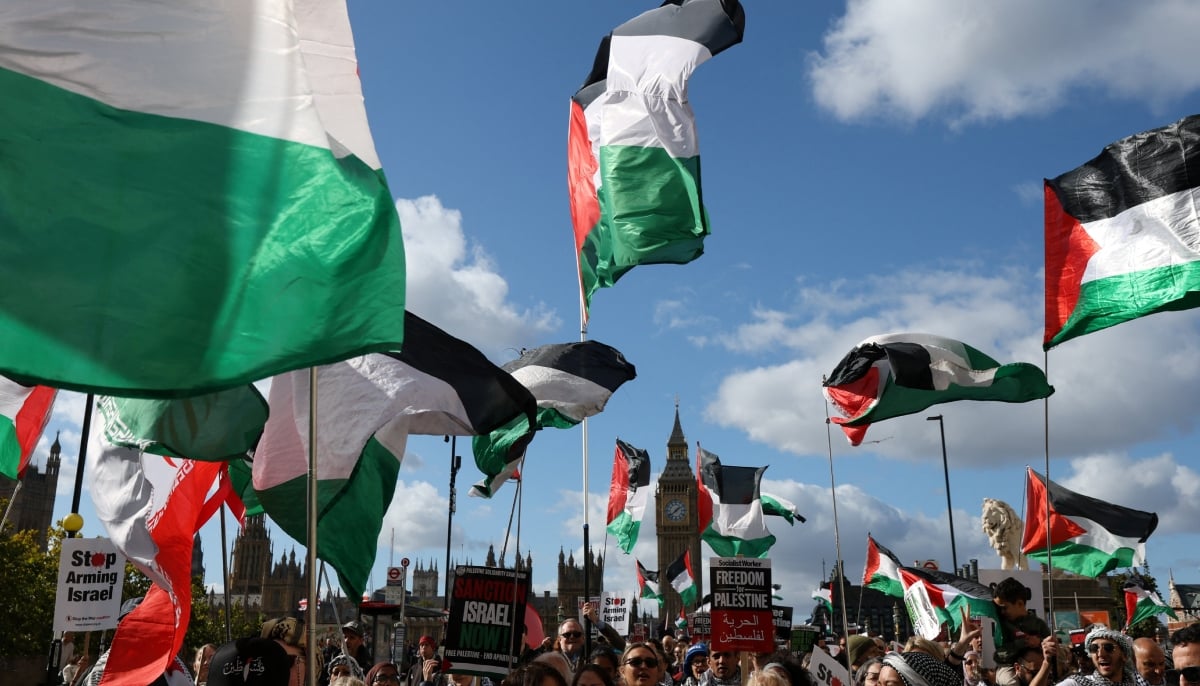People attend a pro-Palestinian protest march through the city to mark the third anniversary of the war in Gaza, in London, Britain, October 10, 2026. — Reuters