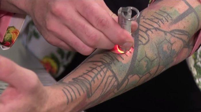 Scientists develop light-activated tattoo ink that can be switched on and off