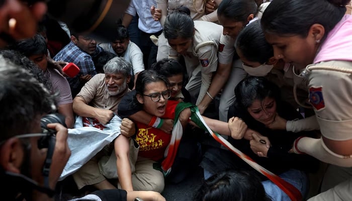 Neha Bora, National President of the All India Students Association (AISA), reacts as she is detained by police during a protest demanding the resignation of Indias Chief Election Commissioner, Gyanesh Kumar, in New Delhi, India, on October 2, 2026.— Reuters