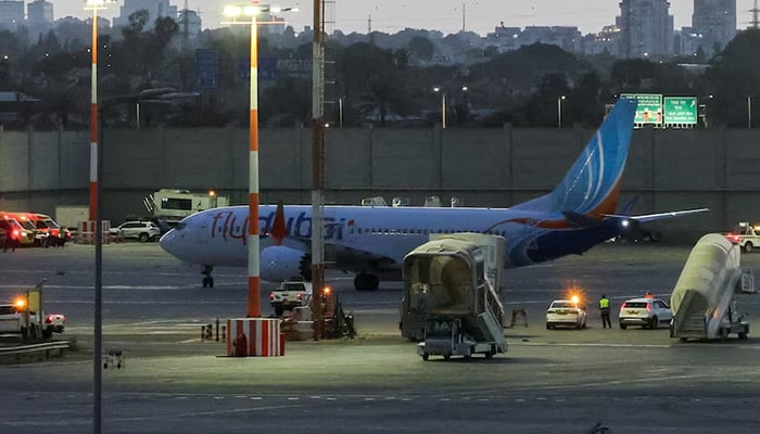 A plane, carrying passengers who were on the flydubai aircraft bound for Israel from the United Arab Emirates, which was diverted to Saudi Arabia following an emergency signal, on the tarmac as it arrives at the Ben Gurion International Airport, in Lod, near Tel Aviv, Israel, September 30, 2026. — Reuters