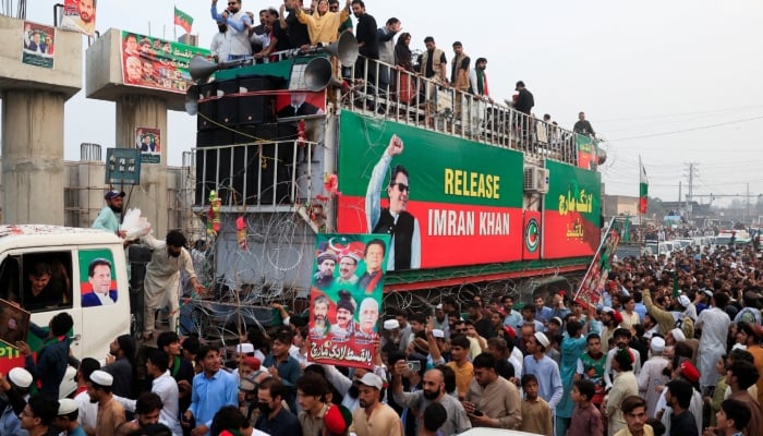 Supporters of former Prime Minister Imran Khans party, Pakistan Tehreek-e-Insaf (PTI), take part in a protest march lead by Sohail Afridi, Khyber Pakhtunkhwa Chief Minister, on the outskirts of Peshawar, KP, October 9, 2026. — Reuters