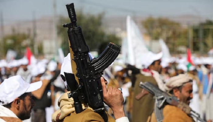 Newly recruited fighters who joined a Houthi military force intended to be sent to fight in support of the Palestinians in the Gaza Strip march during a parade in Sanaa, Yemen, on December 2, 2023.— Reuters