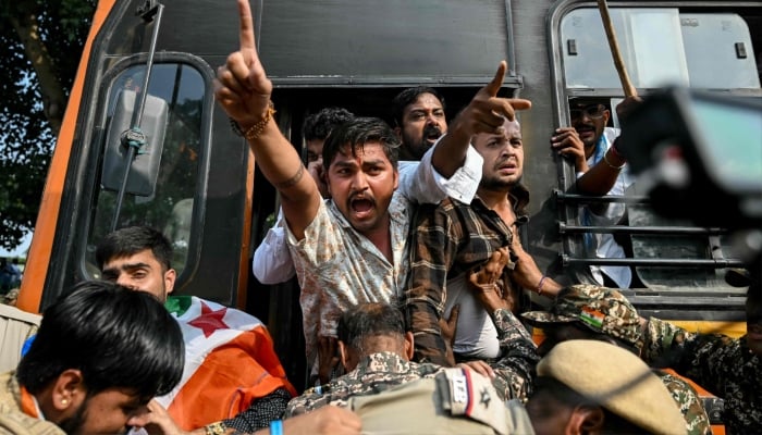 Security personnel detain student activists during a protest demanding the resignation of the nations Chief Election Commissioner Gyanesh Kumar over alleged voter roll irregularities linked to the special intensive revision (SIR), in New Delhi, India October 13, 2026. — AFP