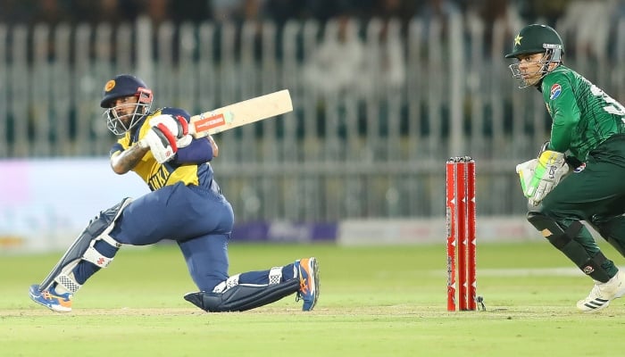 Sri Lanka captain Kusal Mendis (left) watches the ball after playing a shot during their third T20I against Pakistan at the Rawalpindi Cricket Stadium in Rawalpindi on October 13, 2026. — PCB