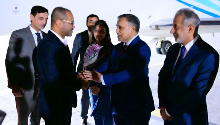 Oman’s Foreign Minister Sayyid Badr bin Hamad bin Hamood Albusaidi (second from right) arrives at Islamabad airport on October 13, 2026. — X/@ForeignOfficePk