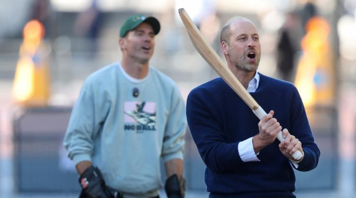 Prince William puts cricket skills on display in front of Buckingham Palace