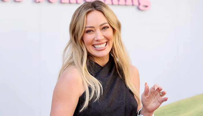Hilary Duff screams as zombie grabs her face at spooky Halloween party
