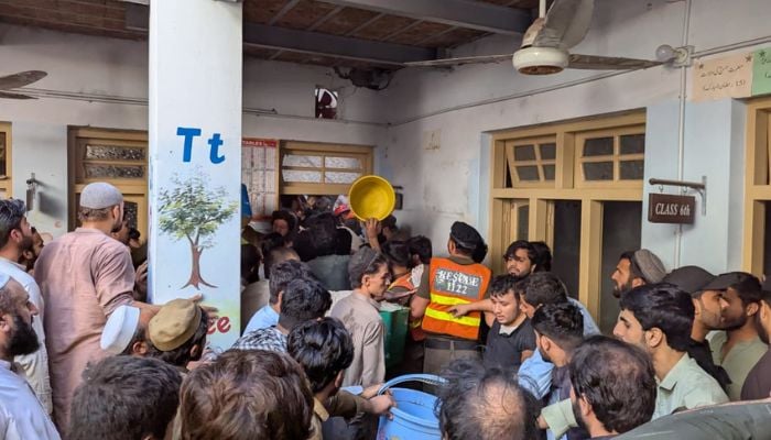 Rescue workers carry out rescue operations at a private school in Peshawar, October 15, 2026. — Reporter