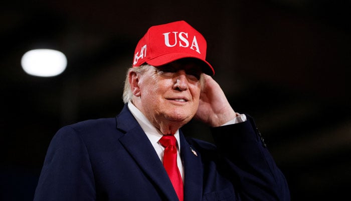 US President Donald Trump smiles during a campaign rally at the Majestic Valley Arena in Kalispell, Montana, US, October 14, 2026.— Reuters