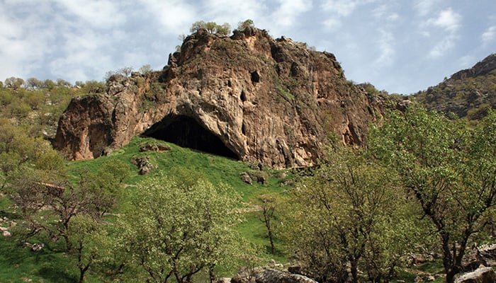 The entrance to Shanidar Cave in Iraqs Kurdistan region, a site of important Neanderthal remains, is seen in an undated photograph released on October 15, 2026. — Reuters