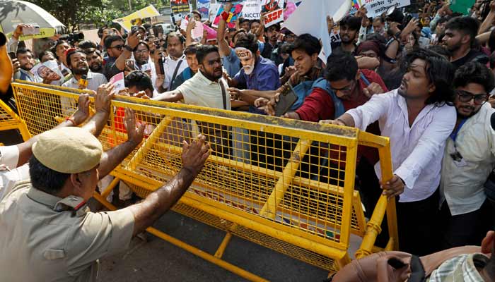 Demonstrators push against a police barricade during a protest demanding the resignation of Indias Chief Election Commissioner Gyanesh Kumar, in New Delhi, India, October 3, 2026.— Reuters