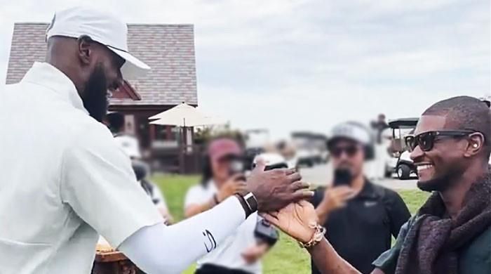 Usher gets birthday surprise from LeBron James on golf course