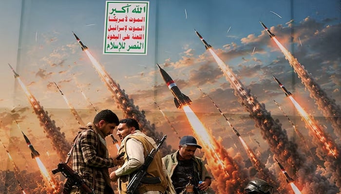 Houthi activists stand on a platform against a banner depicting Houthi missiles at an anti-Saudi rally amid an escalation with the kingdom, in Sanaa, Yemen, July 31, 2026.— Reuters