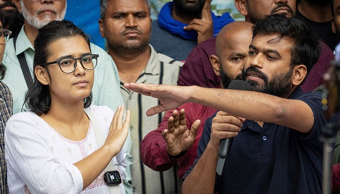 Abhijeet Dipke (right), founder of the Cockroach Janata Party (CJP), and Neha Bora, national president of the All India Students Association (AISA), gesture as they address a press conference in New Delhi, India, October 15, 2026. — Reuters