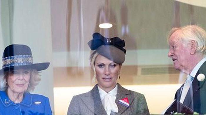 Queen Camilla's former husband makes headlines with Zara Tindall by her side