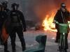 French police clash with protesters as tens of thousands rally over cost of living