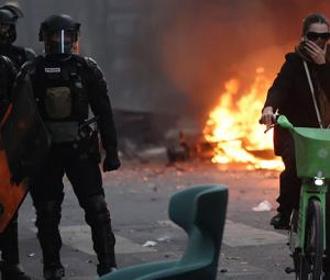 French police clash with protesters as tens of thousands rally over cost of living