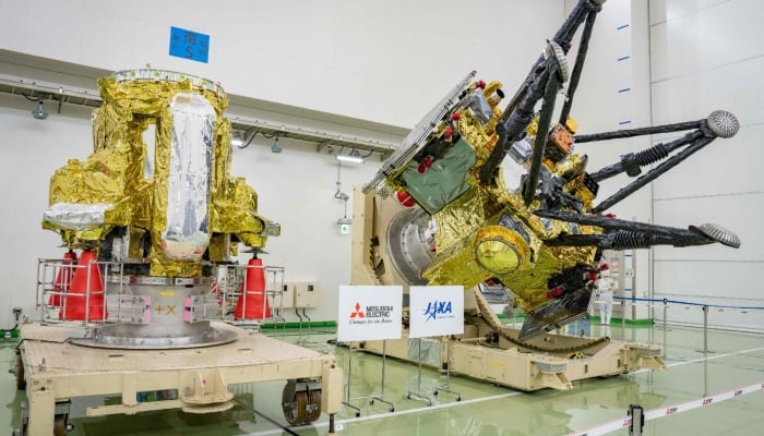 A Propulsion Module (L) and Exploration and Return Modules (R), making up the Martian Moons eXploration (MMX) spacecraft, are seen at the Tanegashima Space Center in Minamitane, Kagoshima prefecture on August 13, 2026. — AFP