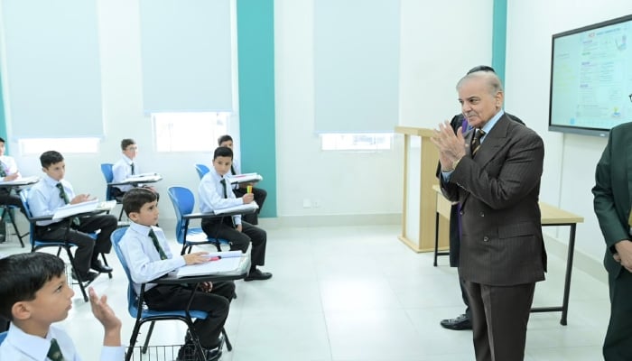 Prime Minister Muhammad Shehbaz Sharif interacts with students at Daanish School in Islamabad on 18 October 2026. — APP