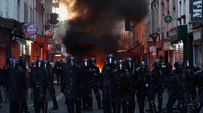 Tensions flare again in Paris as France counts cost of worst unrest in years